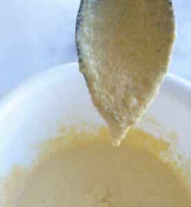cornbread batter with a spoon