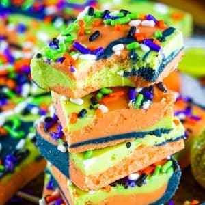 orange black and green halloween fudge with sprinkles