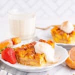 honey bun bread pudding with strawberries and whipped cream