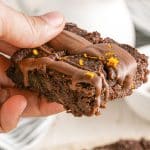 hand holding a thick sweet potato fudge brownie