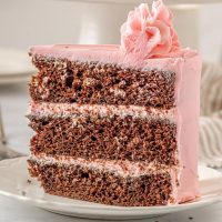 slice of kahlua chocolate coffee cake with strawberry buttercream frosting