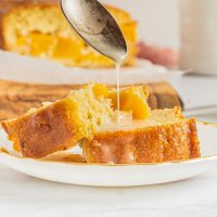 glaze pouring over peach bread slices