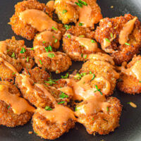 crispy shrimp with bang bang sauce on top