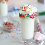 birthday cake shot with whipped cream and sprinkles